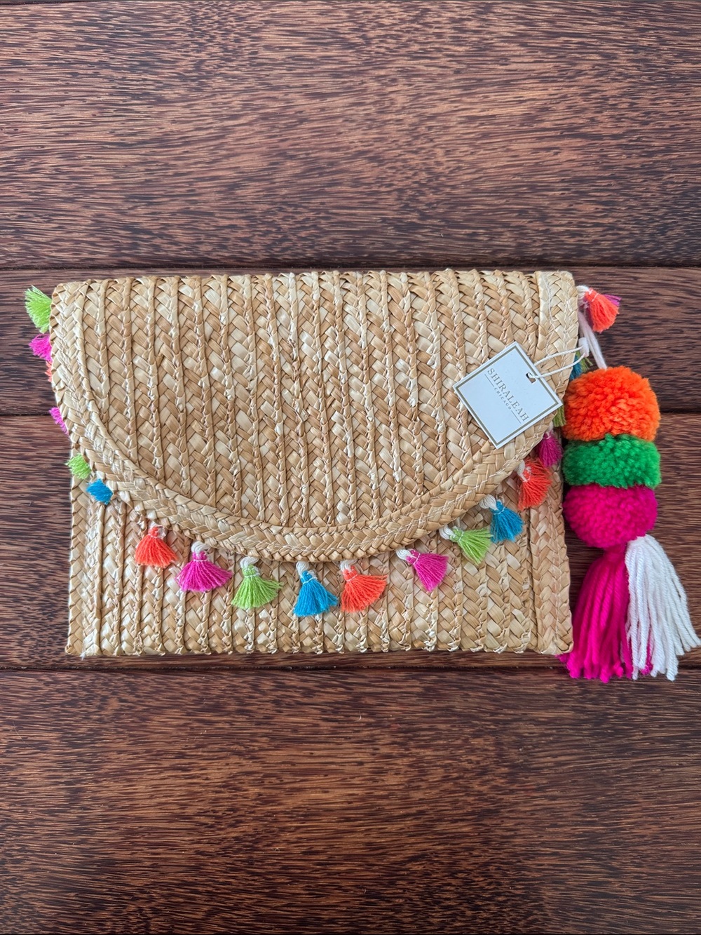 Shiraleah Multicolor Pom Pom Straw Clutch with Tassel Trim